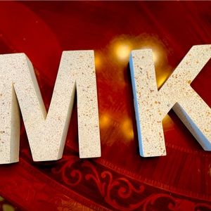 Porcelain letters M and K